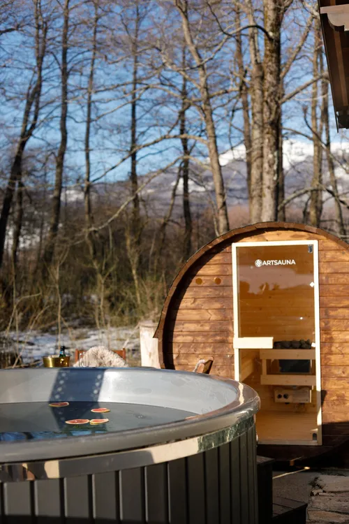 Hot tub and sauna with mountain view